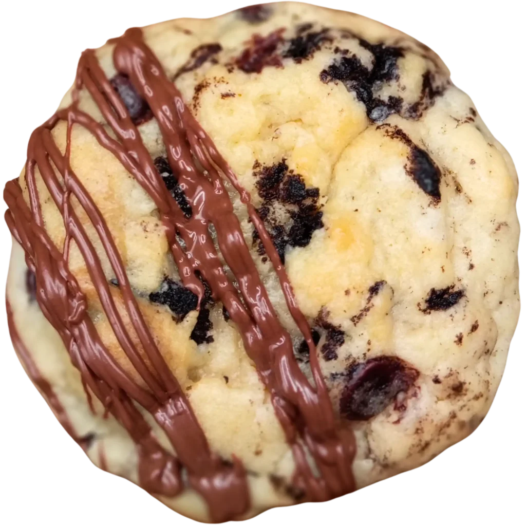 Oreo Dream gourmet cookie with cream cheese base, chocolate chip and Oreo chunks, drizzled with chocolate.