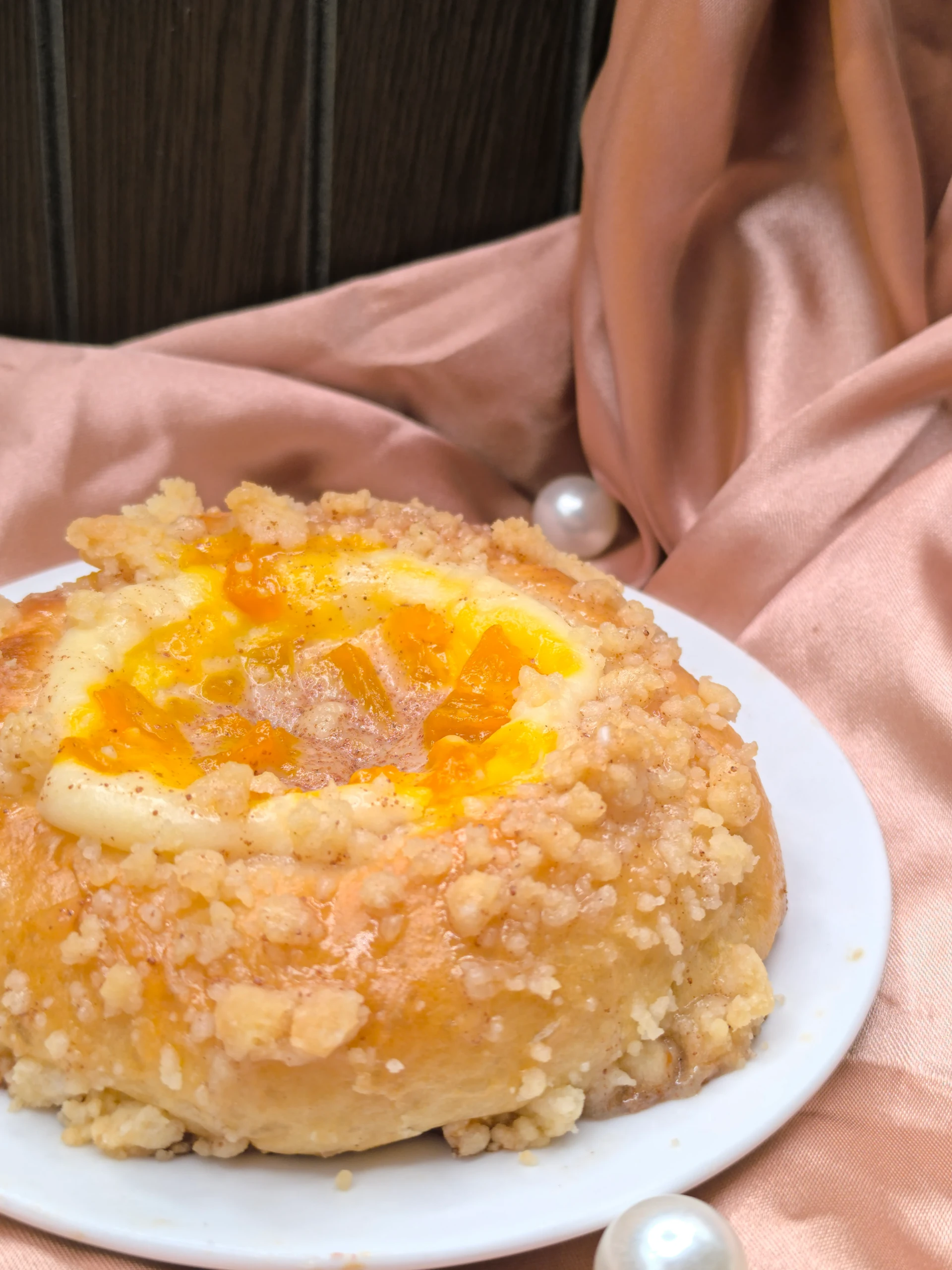 Peachy Peach Sinful Bun, soft milk bread filled with real peach and topped with crumble.