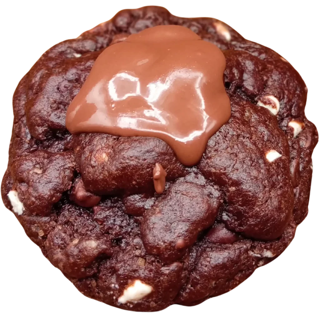 Triple Chocolate cookie in dark cocoa dough loaded with white chocolate chunks and a chocolate drizzle.